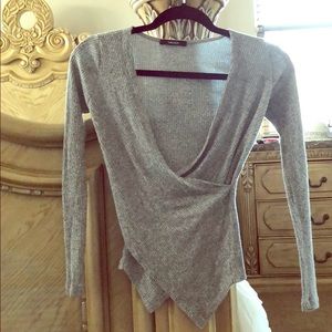 Wrap over top.  Wore only twice.